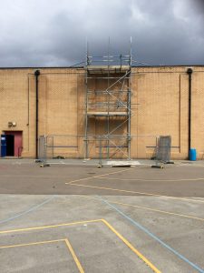 scaffold tower for safe roof access to a large building