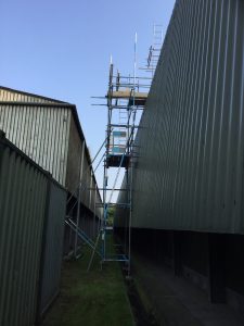 scaffolding for roof access to a large barn on a farm - image 2