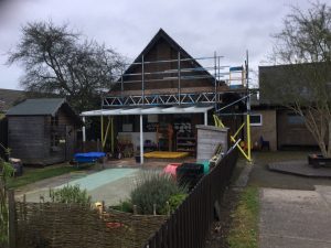 scaffolding on the back of a small nursery