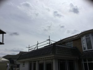 scaffolding railing on roof for safety - image 6