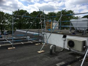 scaffolding railing on roof for safety - image 2