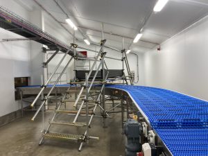 industrial scaffolding over factory equipment - image 5