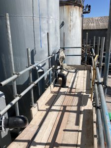 scaffolding on side of commercial storage tanks - image 3